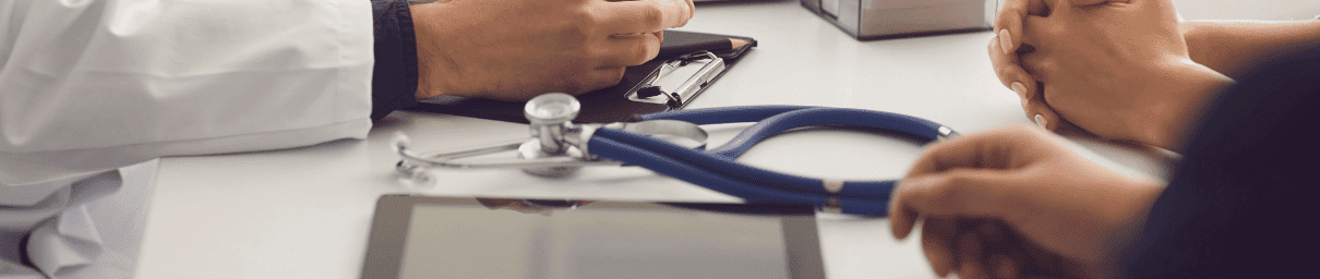 Medical transcription interface showing doctor's hands with stethoscope